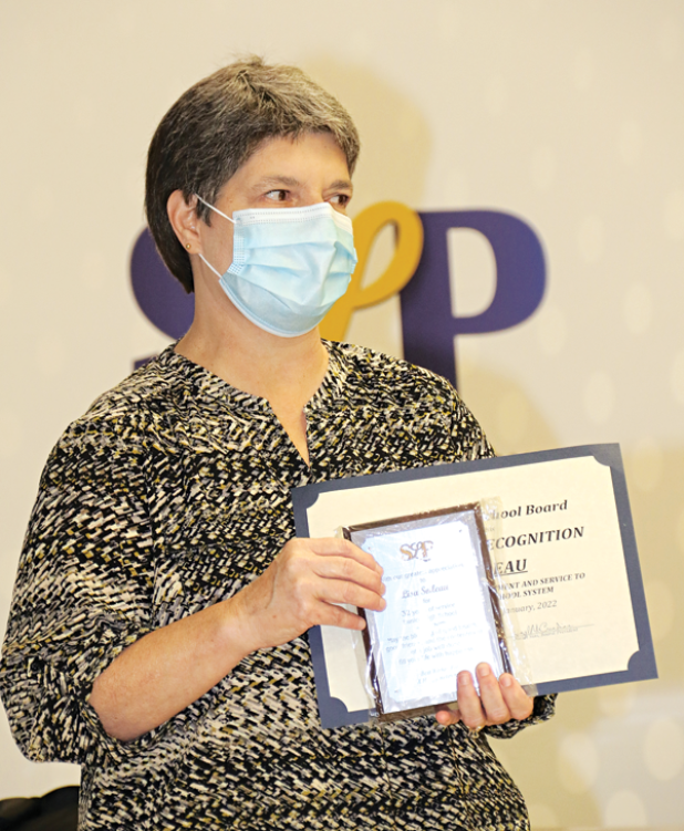 Eunice High School French teacher Lisa Soileau was honored at Thursday’s St. Landry Parish School Board on her retirement after serving more than 32 years. She has been a French teacher for more than 28 years at the high school. (Photo by Harlan Kirgan)