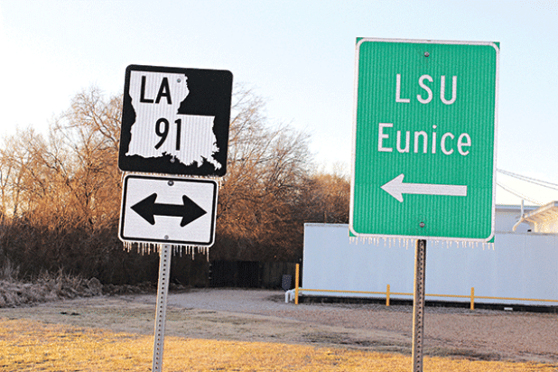 Icicles formed on road road signs after Monday’s rain quickly froze as temperatures plummeted in the afternoon. Morning lows on Tuesday and Wednesday dipped into the upper teens.  (Photo by Myra Miller)