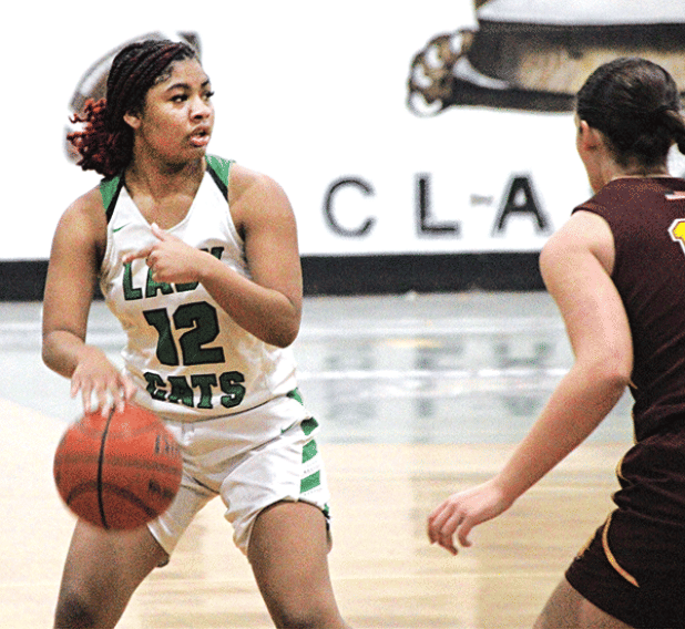 Eunice’s Akeviona Monday attempts to make a move on an Iota defender during Monday’s 49-28 loss to the Lady Dogs that dropped the Lady Cats’ overall record to 5-19 on the season. (Photo by Rhett Manuel)