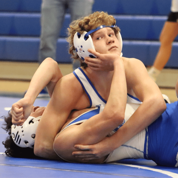 The St. Edmund High School wrestling team hosted its last home tri-dual meet on Wednesday night. Wesley Reed is shown in the process of winning his match against an Erath opponent. (Photo by Amy Myers)