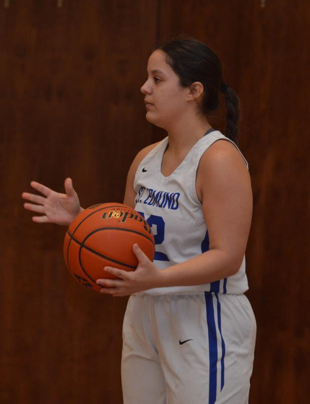 St. Edmund’s Preslee Perron looks to pass the ball. (Photo by Tom Dodge)