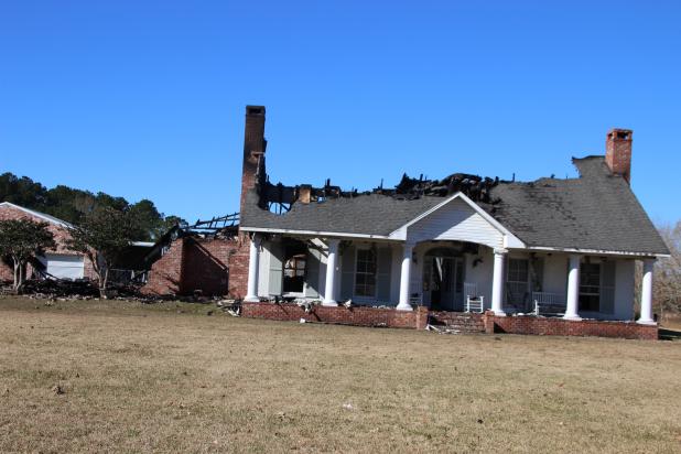 Fire destroys home on Dan Drive. (Photo by Myra Miller)