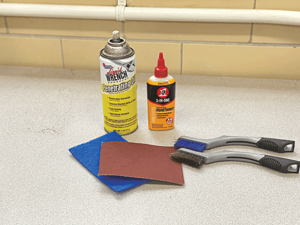 Brushes, scouring pads, sandpaper and lubricating oils are best for hand pruner maintenance. (Photos by Heather Kirk-Ballard/LSU AgCenter)