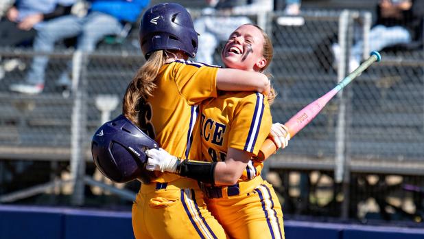 Makinzey Elisar and Kadyn Schenk celebrate. (Photo by Travis Webb)