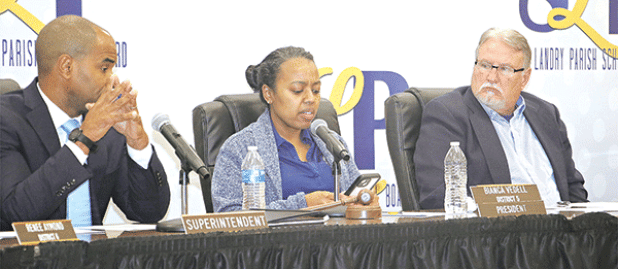 St. Landry Parish School Board President Bianca Vedell, center, explains her opposition to a parish school reorganization plan at special meeting on Thursday in Opelousas. Also shown, from left, are Superintendent Milton Batiste III and School Board Vice President Randy Wagley. (Photo by Harlan Kirgan)