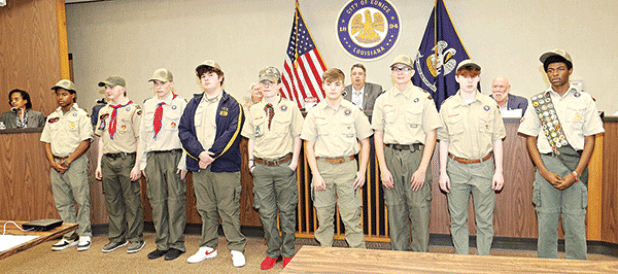 Boy Scout Troop 425 was recognized at the Feb. 14 Eunice Board of Aldermen meeting for its repair work at the Eunice Depot Museum. The scouts sealed the ramp and deck on Feb. 5. Scouts, from left, are Dreylan Babino, Caden Schoeffler, Jared Joyce, Noah LeJeune, Eli Manuel, Andrew Fontenot, Devan Joyce and Bryson Higginbotham. Scout Gage McGee was unable to attend the council meeting, but contributed significantly to the project, stated  Council Chair Matthew Schoeffler. Brandon McGee is the scoutmaster. Sho