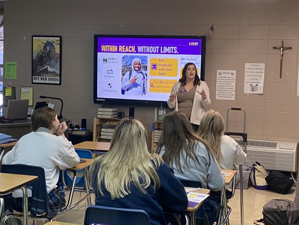 Joshua Perrodin, Director of Admissions and Recruiting, and above, Alex Hammond, Admissions Counselor and Recruiter with LSU Alexandria, talk  to juniors at St. Edmund
