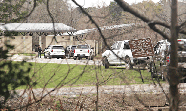 The Eunice City Lake was the focus of an intense search on Tuesday for a missing woman’s body, but the body was eventually found off La. 10 near Beggs. The investigation was led by the St. Landry Parish Sheriff’s Office. The search at the City Lake was from about 7 a.m. to 4 p.m. (Photo by Harlan Kirgan)