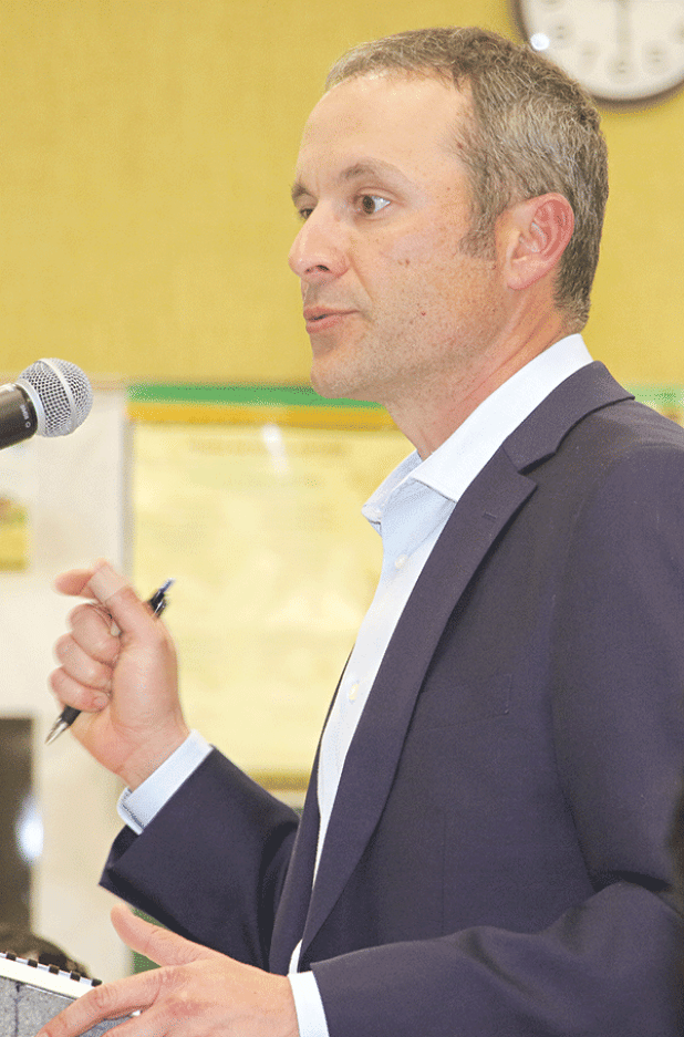 Casey Ardoin, CPA with Kolder, Slaven & Company LLC, discusses an audit of the St. Landry Parish School Board at a Finance Committee meeting on Monday (Photo by Harlan Kirgan)