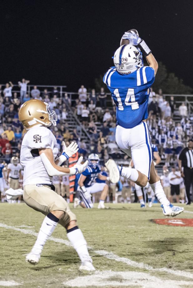 Mark Fruge snares an interception against Sacred Heart of Ville Platte