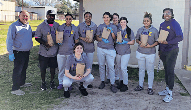 There was a barbecue burger fundraiser sale to benefit the LSUE Women’s Basketball team. The luncheon fundraiser was held at the VFW Hall on Bobcat Drive on Feb. 21. Coach Jamel Samuels extended a “Thank you” to the community of Eunice for supporting the team, and gave a special “Thank you” to the Eunice Community Health Clinic and Glynn Michaud. From left, are Randall Vigee, Basile State Bank; Head Coach Samuels; Kaylan Jack; Tierra Sylvas; Rylie Bergeron; and behind Bergeron is Brynn Hardie, Dayla Simon, 