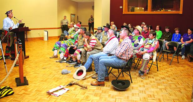 Dr. Barry Ancelet, left, delivers a program on the history of Mardi Gras at the reopened Prairie Acadian Cultural Center on Monday. (Photo by Harlan Kirgan)