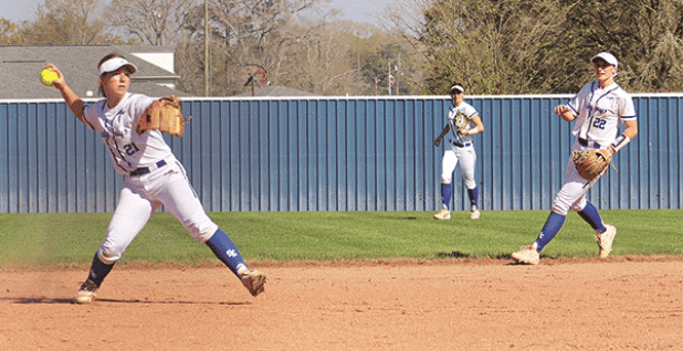 Kourtney Lavergne fielding a ball to make the out at first in a 7-6 win over South Beauregard. (Photos by Amy Myers)