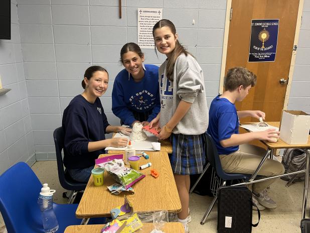 Clay Harper’s eighth-grade science class at St. Edmund are learning the characteristics of one of the three types of volcanoes.