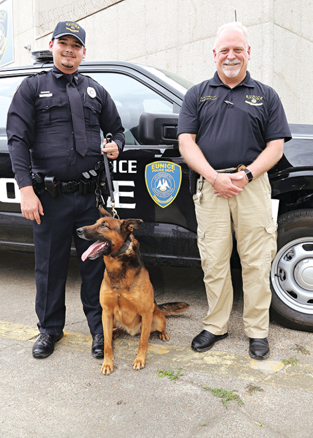 The Town of Mamou donated a police dog to the Eunice Police Department. The K9, named Amos, arrived Tuesday. With Amos, from left, are his new handler, Patrol Officer Keith Peters, and Police Chief Kyle LeBouef outside the Eunice Municipal Complex on Thursday afternoon. (Photo by Harlan Kirgan)