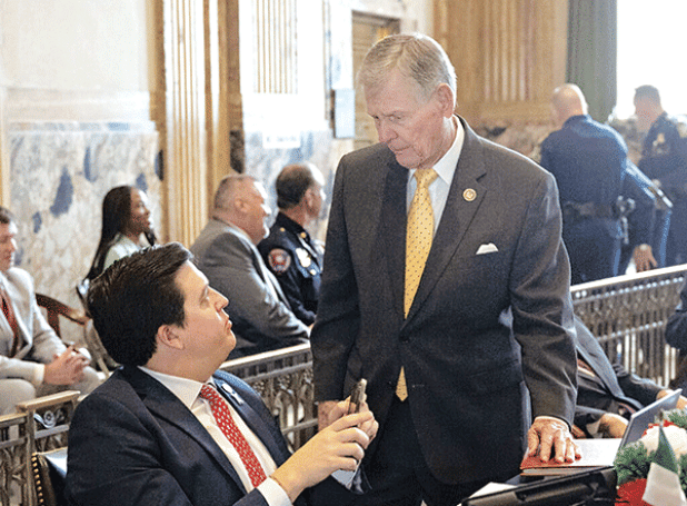 Rep. Dixon McMakin, R-Baton Rouge, seated, listens to Rep. Francis Thompson, R-Delhi, on opening day of the regular legislative session, March 11 at the Louisiana State Capitol in Baton Rouge. (John Ballance/The Advocate, Pool) 