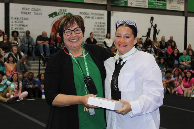 There were three different drawings during the Renaissance Pep Rally and the grandest and biggest prize was drawn at the conclusion of the program. Winning the grand prize of an Apple iPad was Camryn Gradney, a junior. She is pictured with Principal Irma Trosclair.