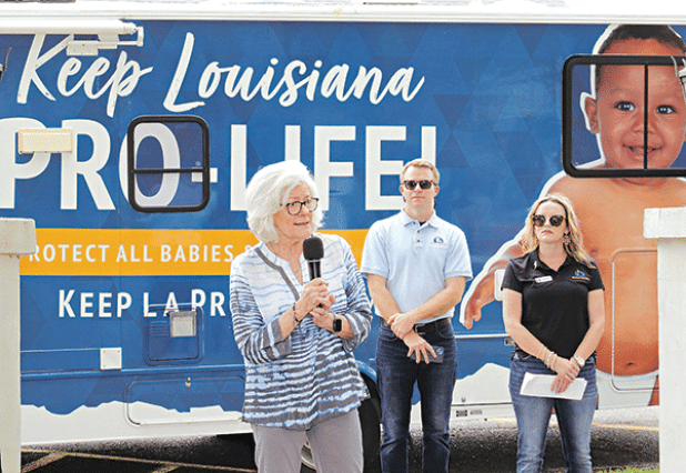 By Harlan Kirgan Editor Louisiana Right to Life brought its tour to Eunice on Thursday asking that the public sign a petition and contact legislators to keep exceptions for rape and incest from becoming legal reasons for abortions.  In front of St. Anthony of Padua Catholic Church at noon, about 60 people, including seniors from Saint Edmund High School, gathered for the 50-stop tour that began in Galliano and ends in Springhill.  The tour in a recreation vehicle started about four weeks ago and is to conti
