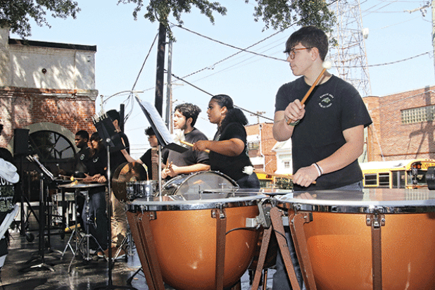 Ty Vidrine plays the timpani during the Eunice High Band performance on Saturday.