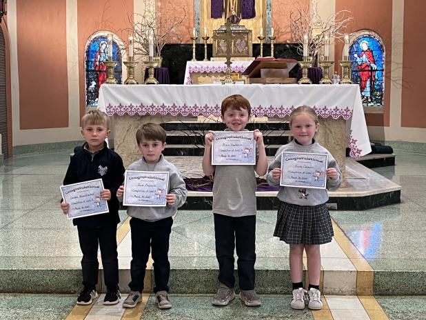 St. Edmund Elementary honored students after Mass for outstanding work. These Pre-k4 completed their Level 4 of ABC Mouse. From left, are Carson Zaunbrecher, Jack Mayeaux, Bryce Duplechin and Greta Cormier (Submitted photos)