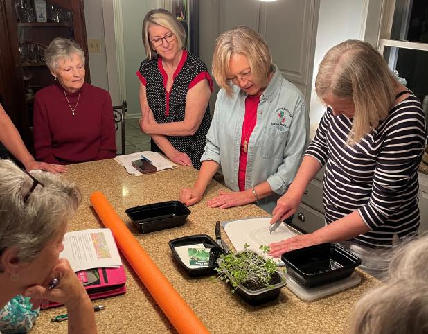 Stephanie Guillory shared her knowledge of Hydroponic Gardening at the Bulb & Blossom Garden Club meeting. From left, are, Erin Jones, Barbara Wells, Jean Johnson, Guillory, and Martha Guempel. 