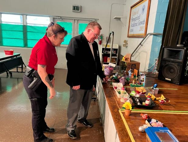 Highland held a Disguise the Egg Contest. The entries were judged by Deputy Chief Eddie Thibodeaux, Lt. Regina Rinaldi, and Sgt. Elizabeth Bernard from the St. Landry Parish Sheriff’s Office. Rinaldi and Thibodeaux take a close look at the entries. (Submitted photo)