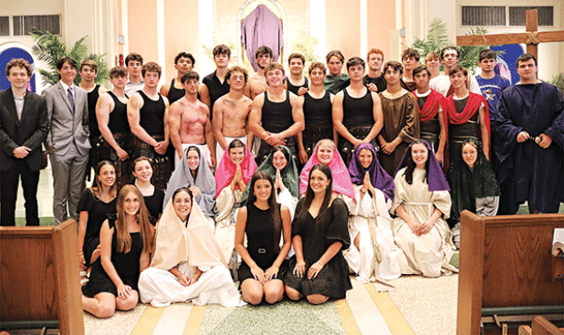 St. Edmund High Senior Class of 2025 presented the Way of the Cross Wednesday at St. Anthony of Padua Catholic Church. Mary, betrayed by Emma Clause, holds her son, Jesus, Koy Trahan, after he was taken down from the cross. (Photos by Amy Myers)