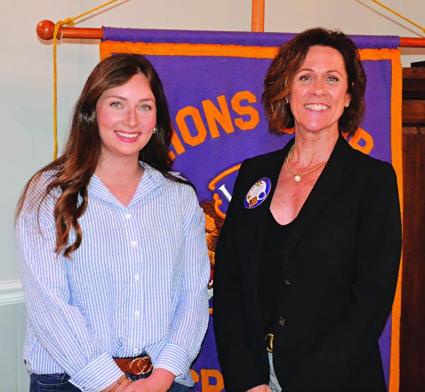 Victoria Callahan, left, sales representative for Parish Rice, was guest speaker for the recent meeting, explaining the health benefits of the Eunice-based product. Welcoming her to the meeting is Nancy Loewer, program chair. (Photo by Steve Bandy/Crowley Post-Signal)