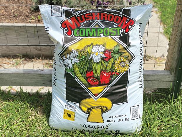 Mushroom compost can add nutrients to soils and potting media.  (Photo by Heather Kirk-Ballard LSU AgCenter)