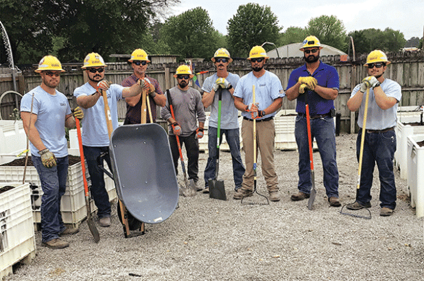 Cleco employees at the Eunice Community Garden on Friday. They were not identified. (Submitted photos)