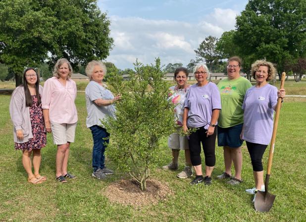 Members present for Arbor Day planting were Sarah Bollich, left, Martha Guempel, Debbie Cristiano, Donna Baltakis, Fran Guillory, April DeRouen and Celeste Gomez.  (Submitted photo)