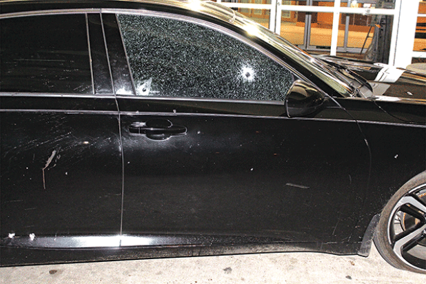 Bullet holes in a car at the scene of a shooting that left 23-year-old Chanterria “Macky” Albert an off-duty St. Landry Parish Sheriff’s corrections officer, dead. (Submitted photo)