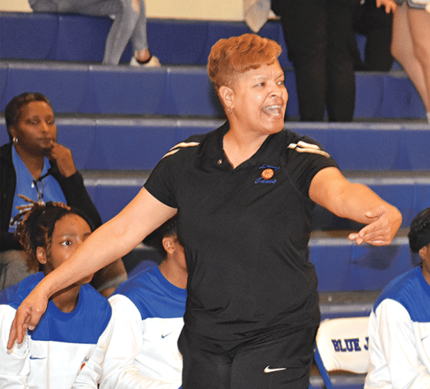 North Central coach Vanessa Taylor gives instruction to her team against St. Edmund during the 2022-23 basketball season. (Photo by Tom Dodge)