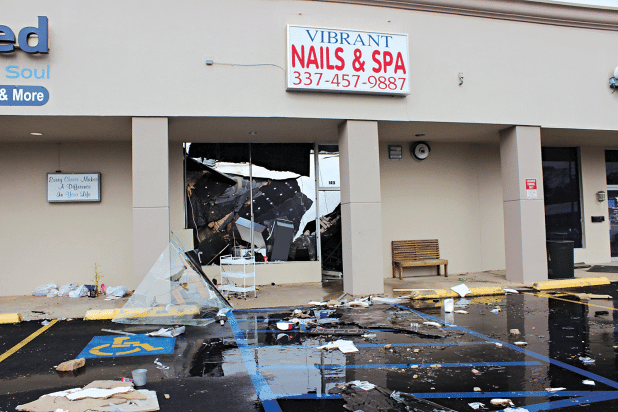Vibrant Nails & Spa located at 143 North Bobcat, Eunice, was destroyed early Friday morning. According to one of the owners Kim Keohavong, “It was an old building. It appears the roof caved in. I know we did experience bad weather as well.” Owners Kim and Bobby Keohavong rented the building space from Samco Properities. The nail salon business has been open since 2014. (Photo by Myra Miller)