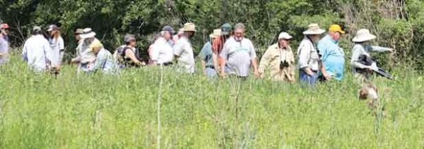 Participants in the Cajun Prairie Habitat Preservation Society’s May meeting are shown at the Eunice site. The society plans its fall meeting this Saturday beginning at its Duralde site at 8 a.m. (Photo by Harlan Kirgan) 