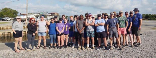 Eunice, Erath, Kaplan FFA chapters, along with other volunteers are ready in the water planting of grass at the Vermillion Bay near Intercoastal Canal for a Re-vegetative project. (Submitted photos)