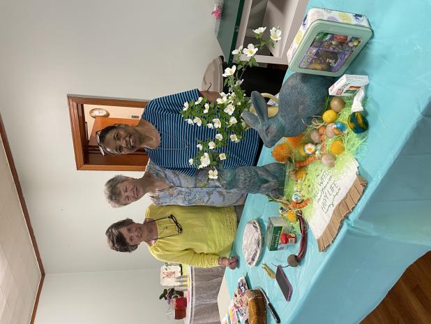 From left, are Lynn Pavich, Erin Jones and Elvonia Reed behind an Easter display including bunny rabbits and eggs during the April meeting of the Bulb and Blossom Garden Club. Lynn Pavich was the speaker and spoke about Easter symbols and Native Lore behind many of Easter traditions. (Submitted photos)  