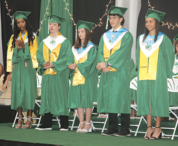 The top five Eunice High School graduates are, from left, Fajah Guillory, Elijah Johnson, Ava Landreneau, Juien Granger and Adayvia Jones. The photo was taken at Wednesday’s commencement at the high school.  (Photo by Harlan Kirgan)