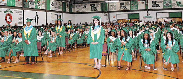 Eunice High School honor graduates stand for recognition during the 2024 graduation ceremony. According to the Louisiana Department of Education Eunice High School had a 95% graduation rate in 2022-2023, which was the highest in St. Landry Parish. (Photo Myra Miller)