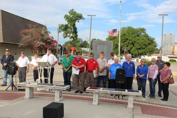 Donnie Fontenot, VFW Post 8971 commander, welcomes the public Monday to the Memorial Day ceremony.