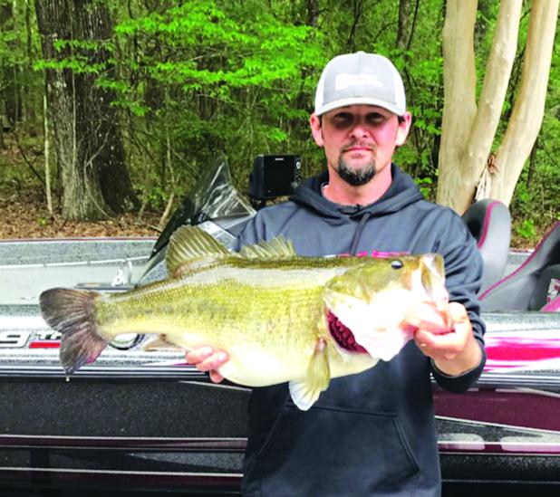 Ricky Fontenot, of Bayou Chicot, holds an 11.22-pound, 26-inch bass t he caught at Chicot Park on March 22. (Photo courtesy of Marianne Fontenot)
