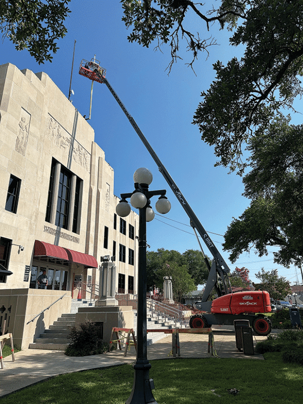Flag poles were placed on the roof of the St. Landry Parish courthouse on Thursday.  The poles are returning to the roof where they originally were located. There will be three placed on the roof. The pole on the roof will be brought down. It’s part of the courthouse renovation work that includes waterproofing, new energy efficient windows and doors, new awning, a handicapped ramp, new courtroom on the third floor, renovated tax assessor’s office and the old courthouse bell will be placed on the grounds in 