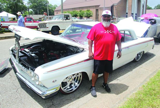 Herman Cassels stands by his 1962 Chevrolet Impala at the Saturday’s Spring Into Summer Car and Truck Show held on 2nd Street and Park Avenue in Eunice. Cassels earned  the Mayor’s Award from Eunice Mayor Scott Fontenot. 
