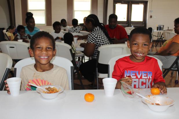 The City of Eunice partnered with the Daisie Mae Foundation, Inc. to offer a free summer feeding program at the Southeast Neighborhood Center, located at 101 City Avenue Drive, that began on June 5 and will conclude on Aug. 9. There are free breakfast served from 9 a.m. until 11 a.m. and lunches from 12 noon until 2 p.m., Monday through Friday. Those ages 1-18 years are welcomed. No application or registration is required. For more information, call at 310-633-4627. From left, are Adrian Robinson, 6, and Br