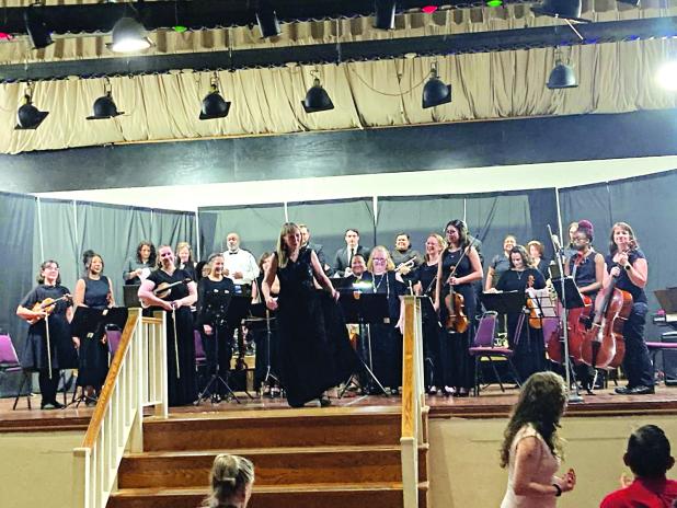 “Final Bow” at the Eunice Symphony Orchestra are Nancy Simon, conductor; and orchestra. The spring concert was held on May 31 inside the Eunice High School auditorium.