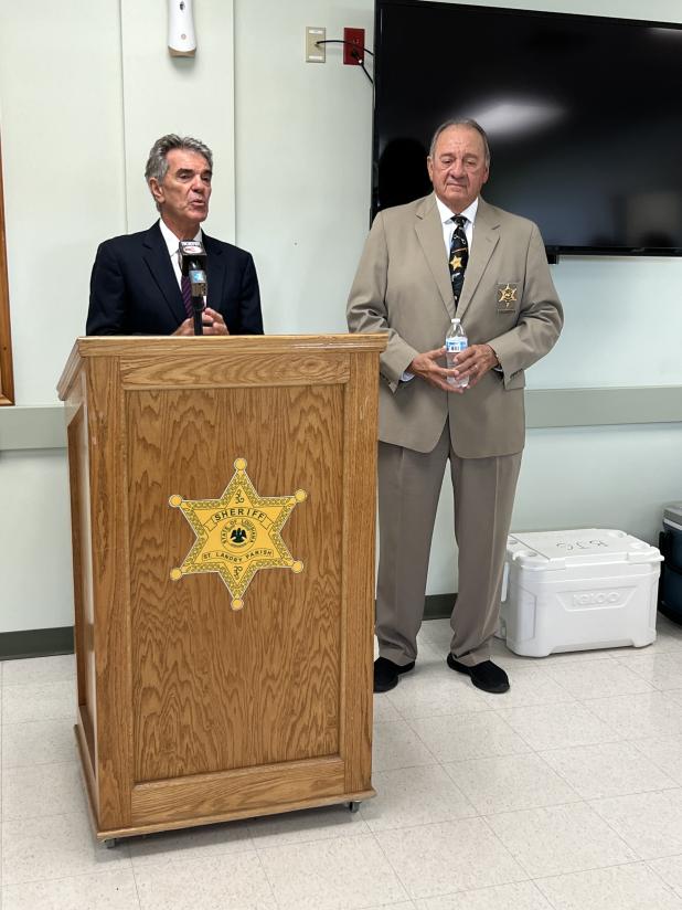 St. Landry Parish Clerk of Court Charles Jagneaux, left, conducts the swearing in ceremony of St. Landry Parish Sheriff Bobby J. Guidroz Thursday. (Submitted photo)