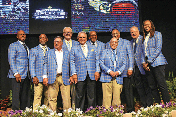 Twelve state sports heroes were inducted into the Louisiana Sports Hall of Fame in ceremonies held June 20 to 22 in Natchitoches. Inductees, from left, back row, are Kerry Joseph, Kevin Jackson, Ron Higgins, Wilbert Ellis, Perry Clark, Tom Burnett and Seimone Augustus. Inductees in the front row, from left, are Ray Sibille, Frank Monica and Bobby Ardoin. (Submitted photo)