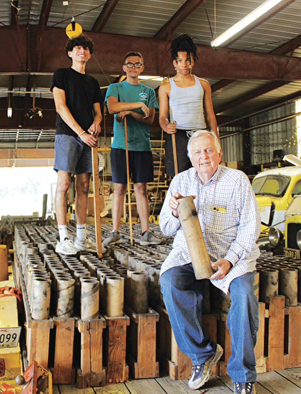 Kenneth Peart, Eunice’s pyrotechnist, prepares for Eunice’s 4th of July Fireworks showing. Peart had volunteer helpers from the Eunice Recreational Department. From left, are Maynard Andrepont, Steven Guidry and Marvelous Walker. The volunteers work at the concession stand at the Eunice Recreational Complex. (Photo by Myra Miller)