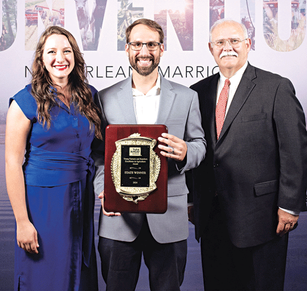 From left, are Raquella and Clint Manuel, YF&R Excellence in Agriculture winners, and Stephen Austin, CEO, Louisiana Land Bank. (Submitted photo)