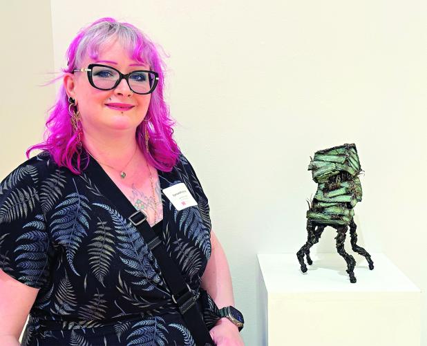 LSU Eunice Assistant Professor of Fine Arts Symantha Jones is with her sculpture seleced for display at the Acadiana Center for the Arts’ (AcA) annual summer group exhibition, Our Point in Space. (Submitted photo) 